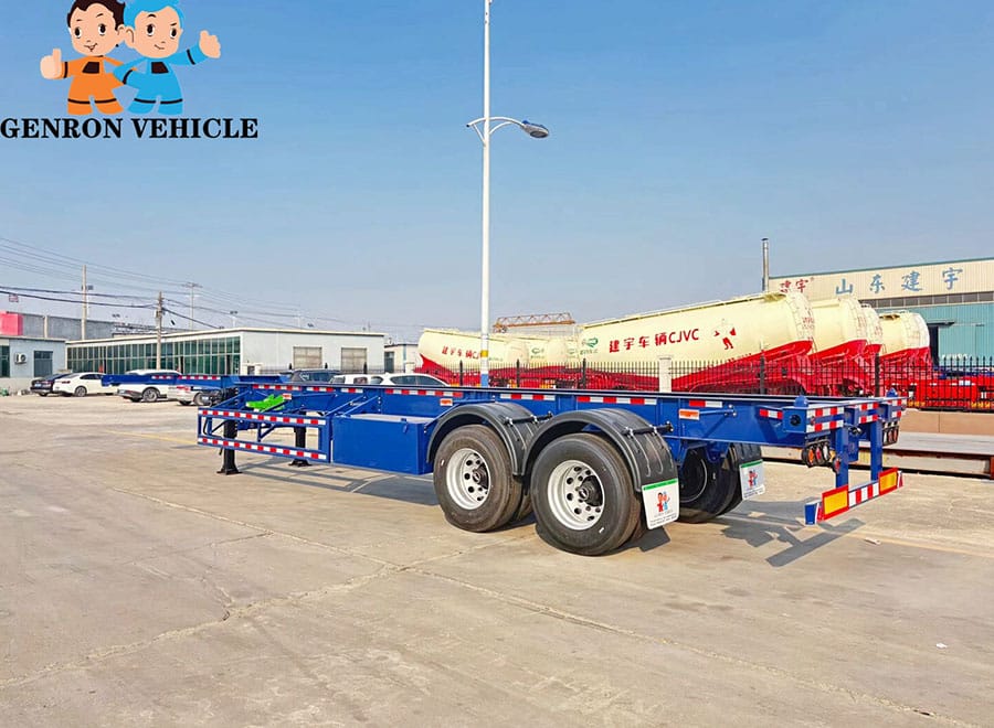 Blue skeletal container chassis viewed from the rear in the yard
