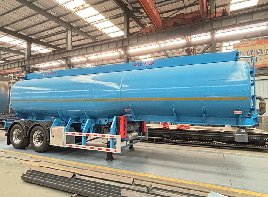 Blue fuel tank semi trailer inside the workshop